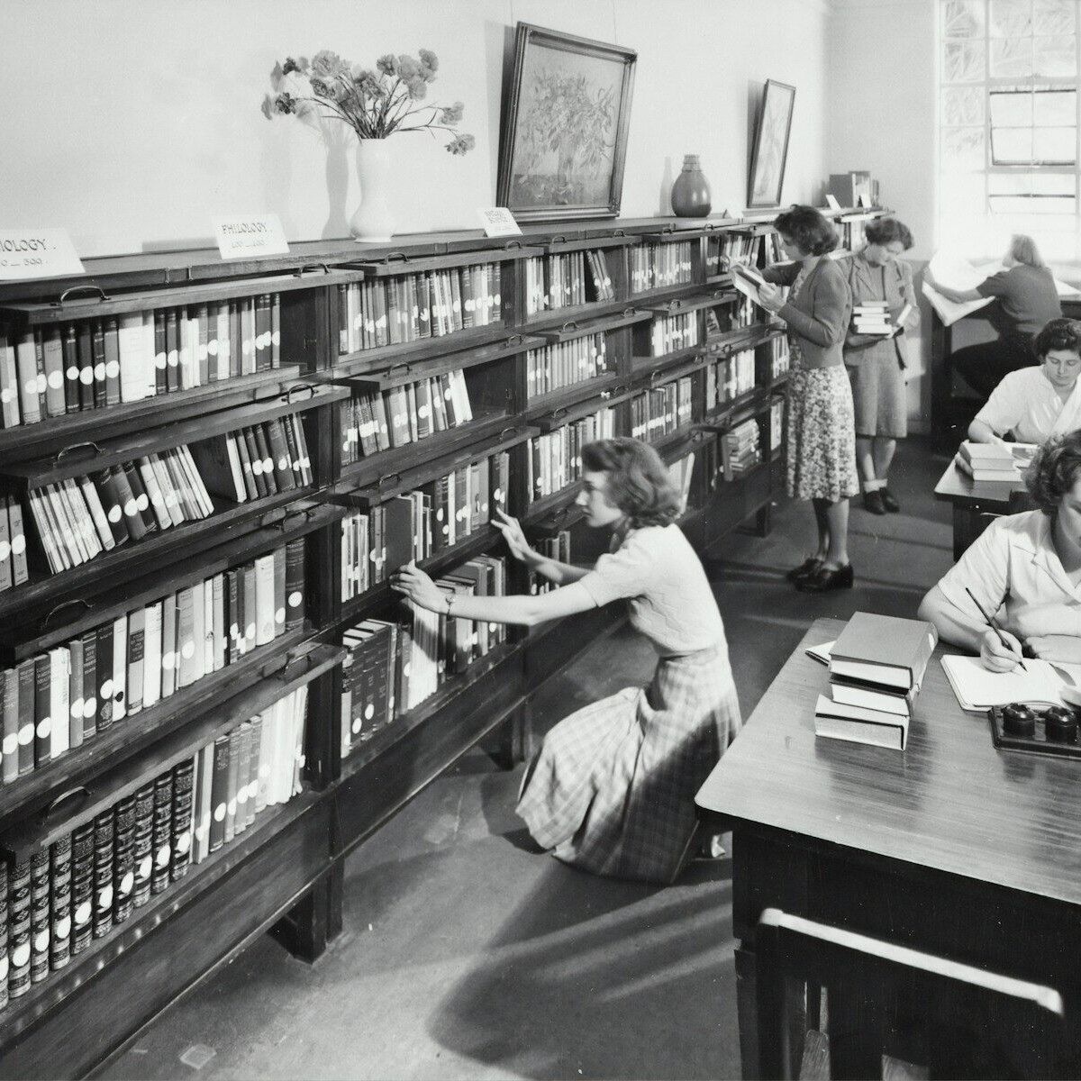 vintage photo of women inside the library
